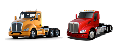 An orange Kenworth day-cab truck next to a red Peterbilt day-cab truck. An orange Kenworth day-cab truck next to a red Peterbilt day-cab truck.