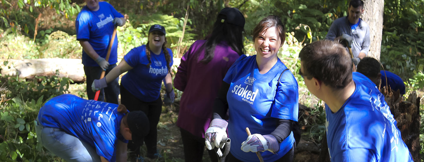 PacLease employees cleaning up a park for United Way's Day of Caring